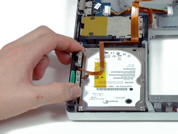 MacBook Pro 17" Models A1151 A1212 A1229 and A1261 Lower Case Replacement: step 35, image 1 of 1