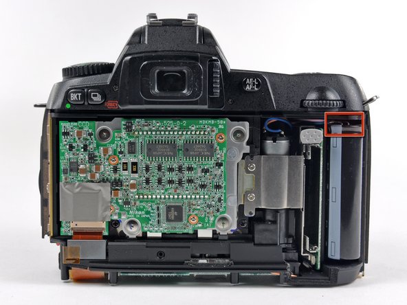 Nikon D70 Port Cover Replacement: step 9, image 2 of 2