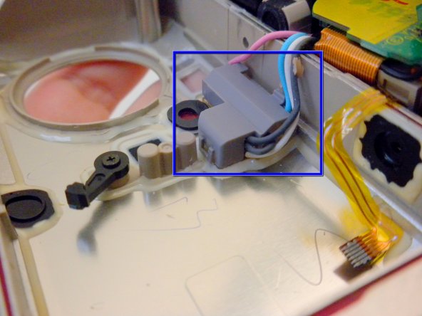 Olympus Stylus 410 Flash Replacement: step 12, image 1 of 2