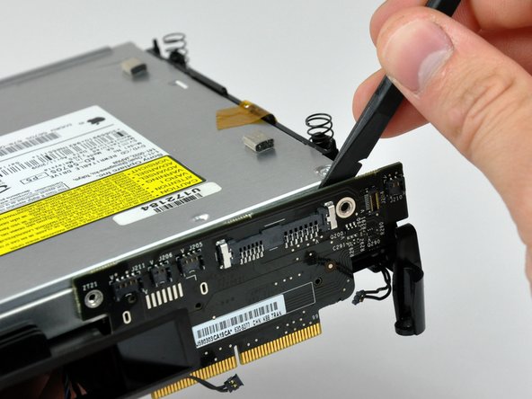 Mac mini Model A1283 Interconnect Board Replacement: step 17, image 1 of 2