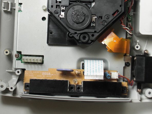 Sega Dreamcast Logic Board Removal: step 10, image 2 of 2