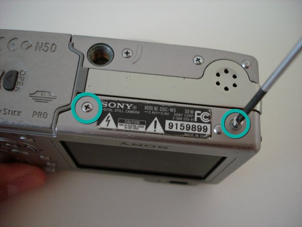 Disassembling Sony Cyber-shot DSC-W5 Back Cover: step 2, image 2 of 2