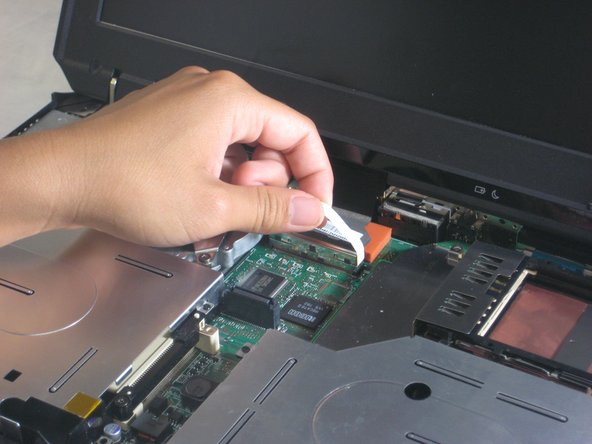 Disassembling IBM ThinkPad A30 Speakers: step 11, image 1 of 2