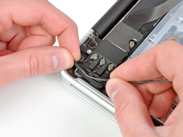 MacBook Pro 13" Unibody Early 2011 AirPort/Bluetooth Board Replacement: step 7, image 2 of 2