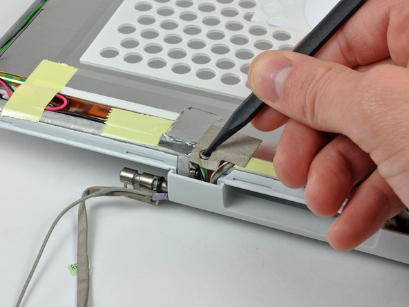 iBook G4 12" 1.33 GHz Front Display Bezel Replacement: step 50, image 2 of 2