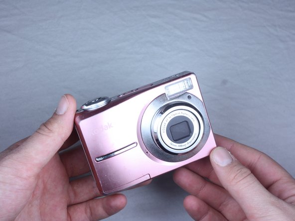 Disassembling Kodak Easyshare C813 Back Cover: step 3, image 1 of 1