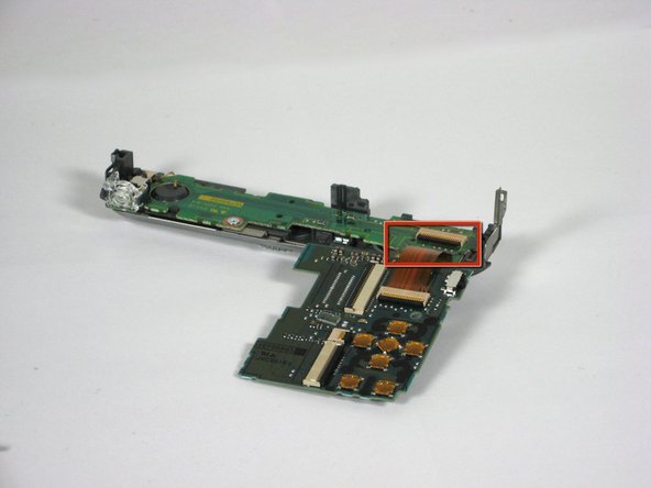 Panasonic Lumix DMC-TZ5 Button Board Replacement: step 11, image 1 of 3