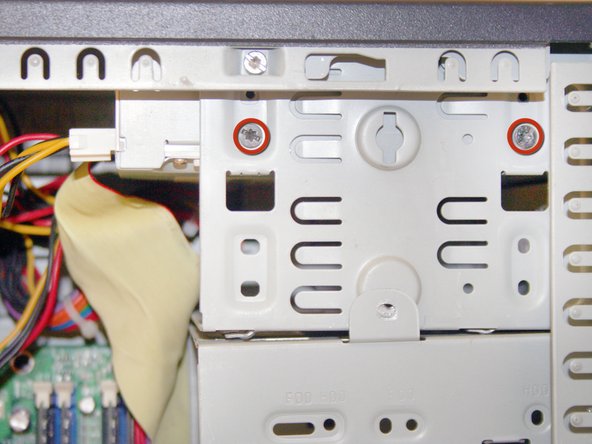 Removing the HP Compaq dx2000MT Optical (CD) Drive: step 6, image 1 of 2