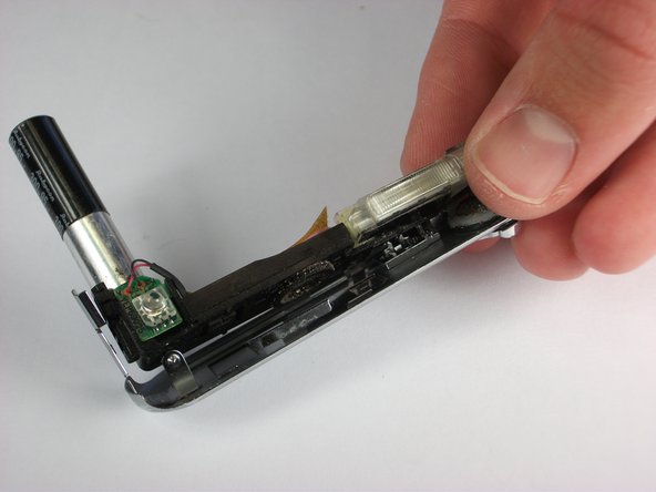 Panasonic Lumix DMC-FX01 On/ Off and Settings Button cover replacement: step 15, image 1 of 2