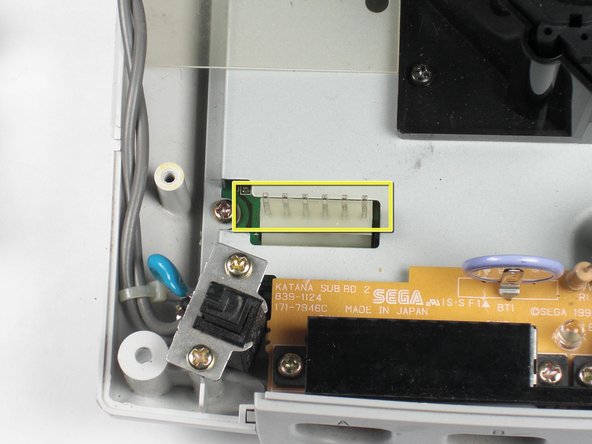 Sega Dreamcast Logic Board Removal: step 7, image 2 of 2