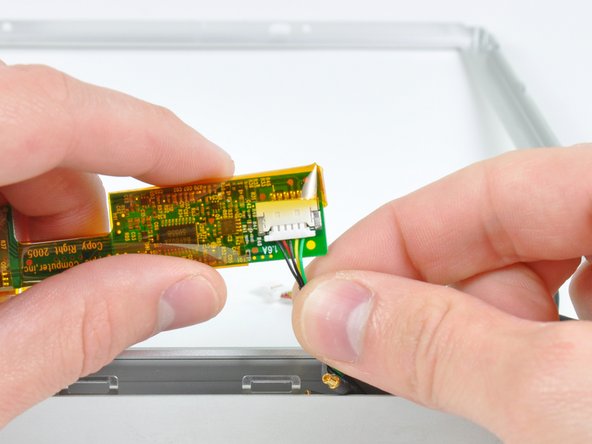 PowerBook G4 Aluminum 15" 1.67 GHz Front Display Bezel Replacement: step 35, image 1 of 1