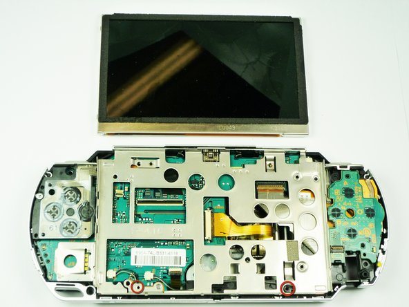 PSP 1000 UMD Door Replacement: step 12, image 1 of 1