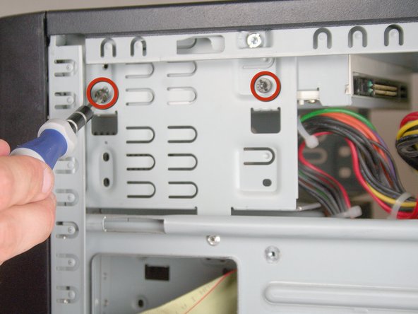 Removing the HP Compaq dx2000MT Optical (CD) Drive: step 7, image 1 of 2