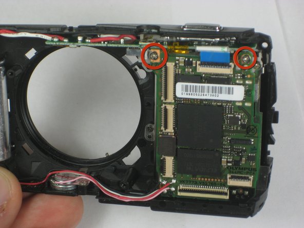 Disassembling Olympus Stylus 1010 Logic Board: step 11, image 1 of 1