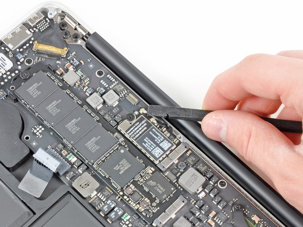 MacBook Air 13" Late 2010 AirPort/Bluetooth Card Replacement: step 4, image 1 of 2