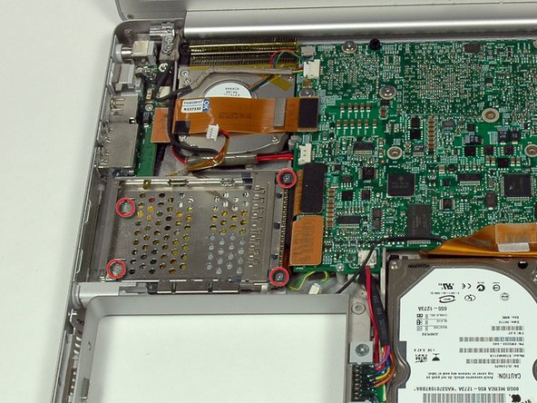 PowerBook G4 Aluminum 15" 1.67 GHz PC Card Cage Replacement: step 14, image 1 of 1