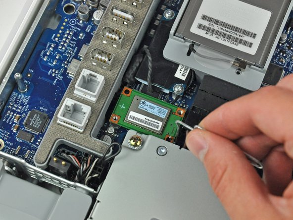iMac G5 20" Model A1076 Bluetooth board Replacement: step 4, image 1 of 2