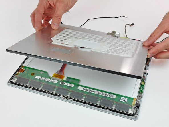 iBook G3 12" Front Display Bezel Replacement: step 57, image 1 of 1