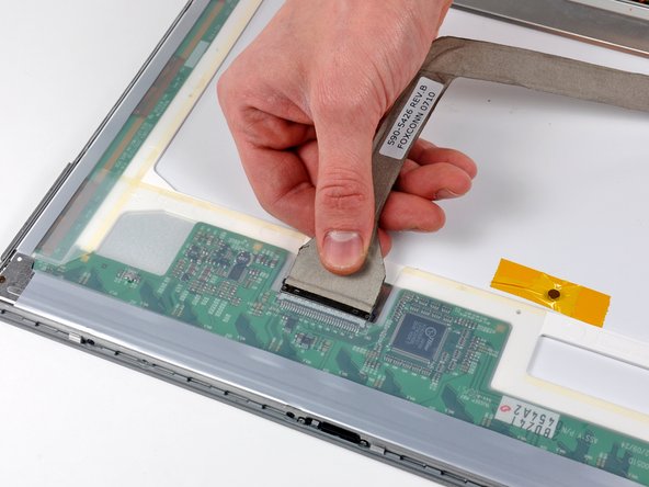 PowerBook G4 Aluminum 17" 1-1.67 GHz Front Display Bezel Replacement: step 39, image 1 of 1