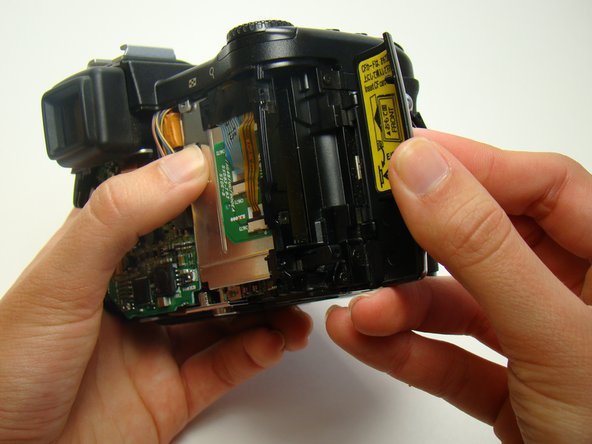 Nikon Coolpix E5700 Speaker Replacement: step 10, image 1 of 2