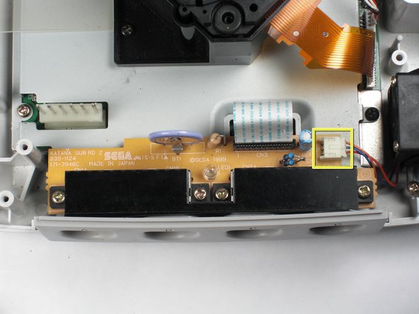 Sega Dreamcast Logic Board Removal: step 11, image 1 of 2