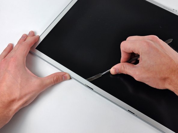 PowerBook G4 Aluminum 17" 1-1.67 GHz Front Display Bezel Replacement: step 47, image 1 of 1