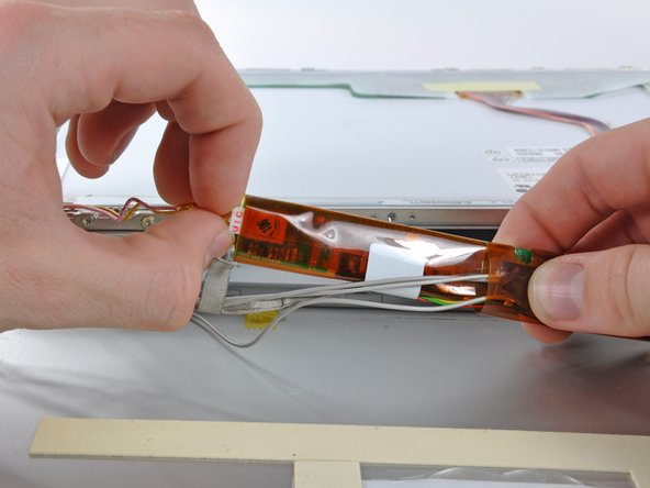 PowerBook G4 Aluminum 12" 867 MHz Display Inverter Replacement: step 76, image 1 of 2