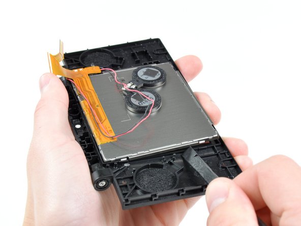 Nintendo DSi Upper LCD/Speakers Replacement: step 31, image 1 of 2