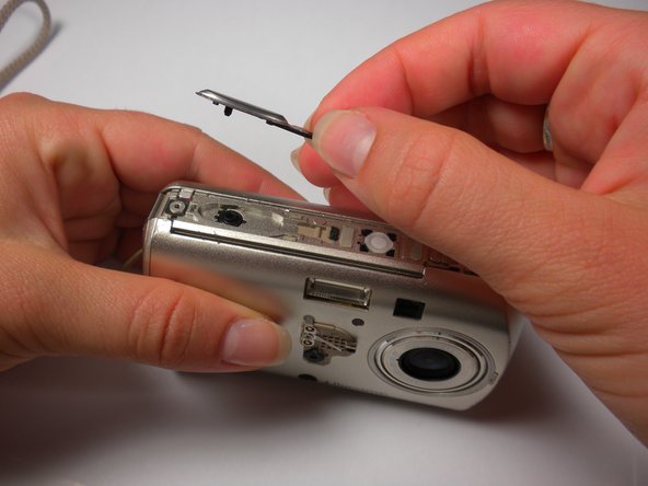 Olympus Stylus 410 Flash Replacement: step 7, image 2 of 2