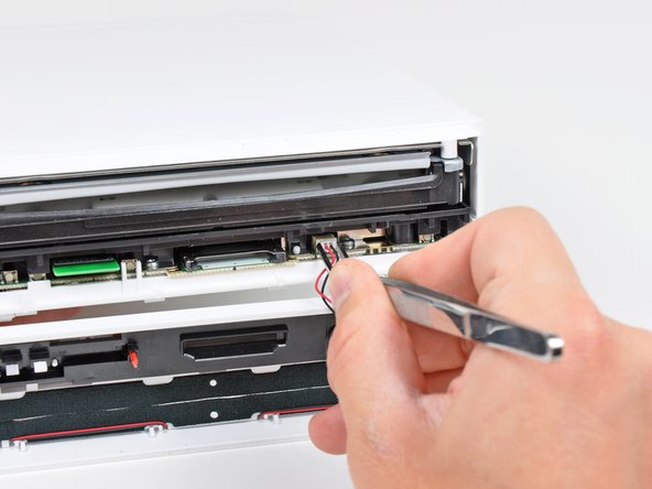 Nintendo Wii Motherboard Replacement: step 6, image 2 of 2