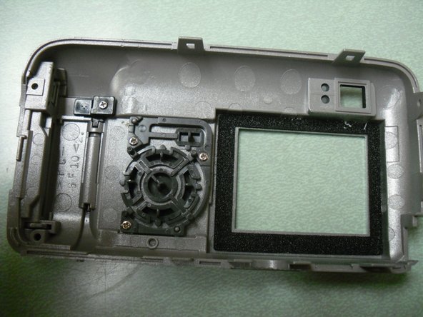 Olympus Camedia D560 Rear Panel Control Buttons Replacement: step 4, image 2 of 3