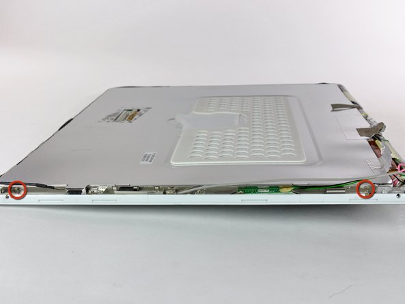 iBook G4 14" 933 MHz-1.33 GHz Front Display Bezel Replacement: step 52, image 1 of 2