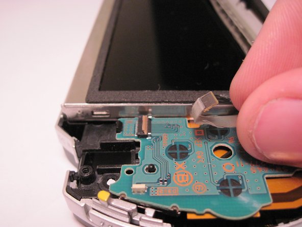 PSP 1000 UMD Door Replacement: step 8, image 3 of 3