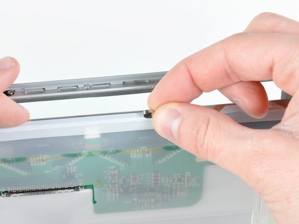 PowerBook G4 Aluminum 17" 1.67 GHz (High-Res) Front Display Bezel Replacement: step 55, image 1 of 2