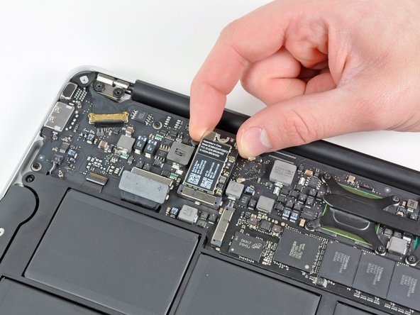 MacBook Air 11" Late 2010 AirPort/Bluetooth Card Replacement: step 6, image 1 of 2