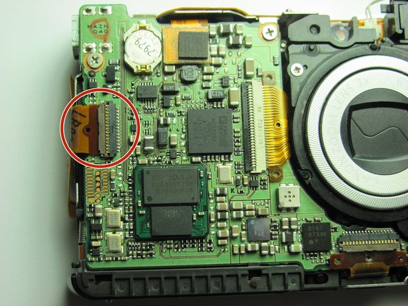 Canon Powershot SD750 Motherboard Replacement: step 12, image 1 of 2