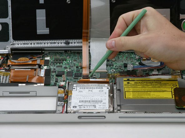 PowerBook G4 Aluminum 15" 1-1.5 GHz PC Card Cage Replacement: step 12, image 1 of 1