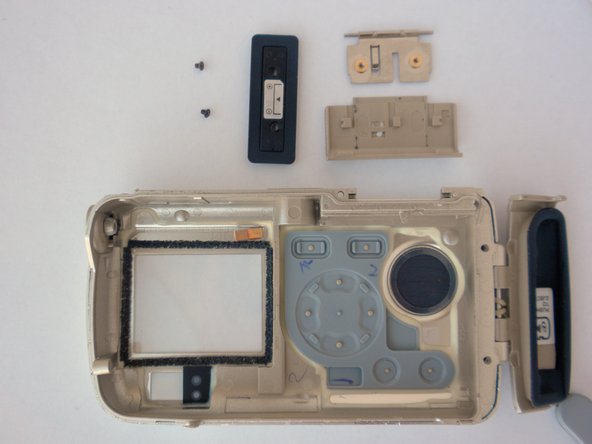 Olympus Stylus 410 Battery Cover Replacement: step 15, image 1 of 1