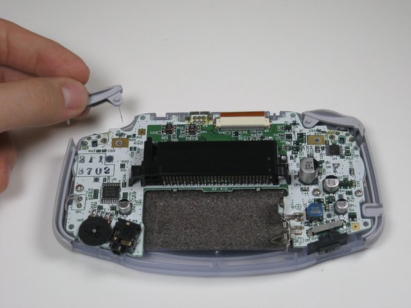 Game Boy Advance Shoulder Button and Side Panels Replacement: step 5, image 1 of 2