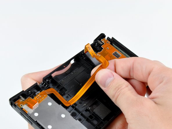 Nintendo DSi Trigger Button/SD Board Assembly: step 11, image 2 of 2