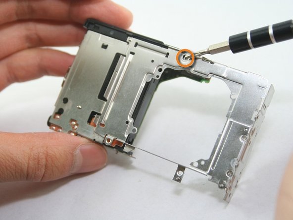 Disassembling Canon PowerShot SD1100 IS AV port and Logic board: step 21, image 2 of 2