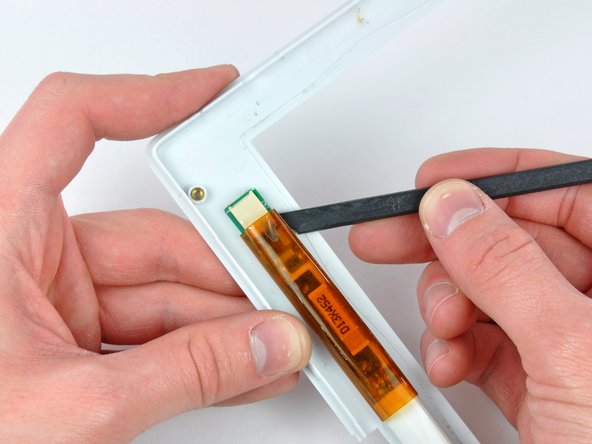 iBook G4 14" 933 MHz-1.33 GHz Front Display Bezel Replacement: step 70, image 1 of 2