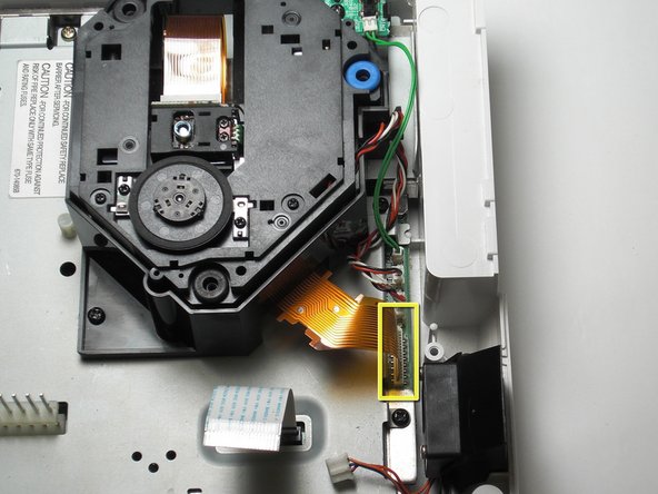 Sega Dreamcast Logic Board Removal: step 13, image 1 of 2