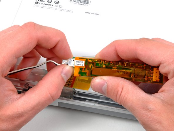 MacBook Pro 17" Models A1151 A1212 A1229 and A1261 Antenna Cover Replacement: step 24, image 1 of 2