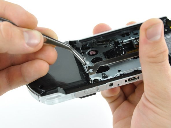 PSP 300xc UMD Brace Replacement: step 18, image 2 of 2