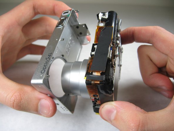 Disassembling Pentax Optio S4i Lens Assembly: step 5, image 2 of 2