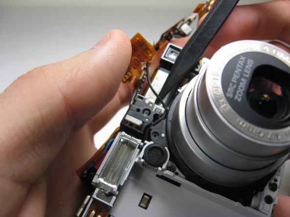 Disassembling Pentax Optio S4i Lens Assembly: step 23, image 3 of 3
