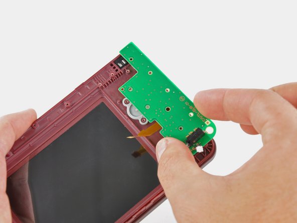 Nintendo DSi XL Hinges Replacement: step 29, image 2 of 2