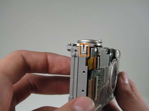 Canon PowerShot S500 AV Port Replacement: step 17, image 1 of 2